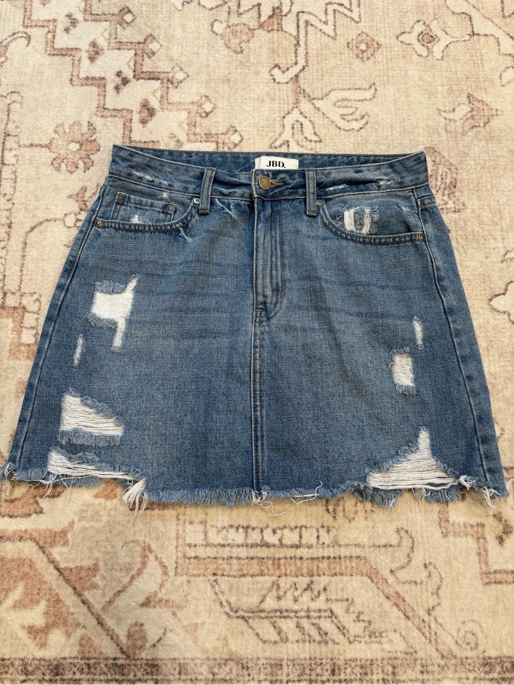 JBD Women’s Distressed Raw Hem Denim Mini Skirt in Blue